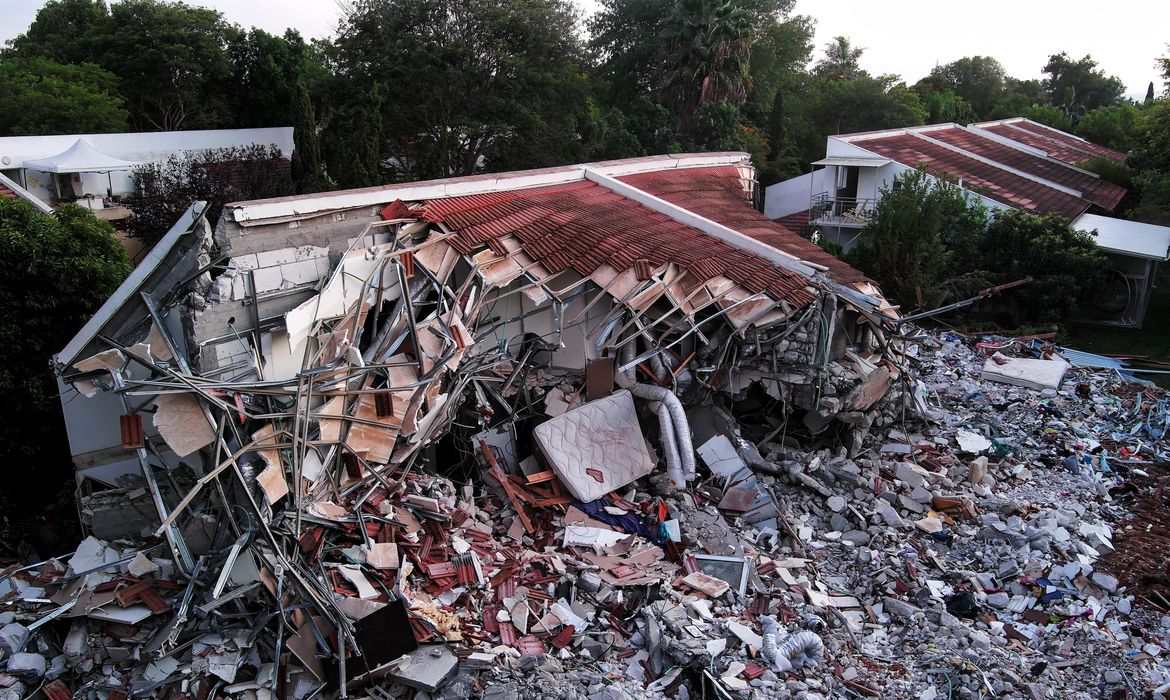 An aerial view shows damage caused following a mass infiltration by Hamas gunmen from the Gaza Strip, in Kibbutz Beeri in southern Israel