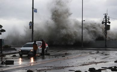 FILE PHOTO: A wave caused by Typhoon Hinnamnor hits the waterfront in Busan