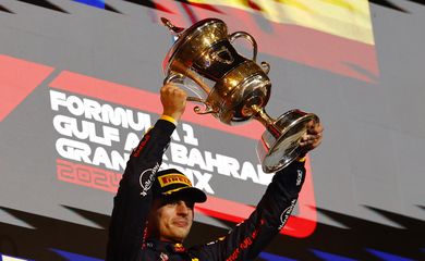Formula One F1 - Bahrain Grand Prix - Bahrain International Circuit, Sakhir, Bahrain - March 2, 2024
Red Bull's Max Verstappen celebrates with a trophy on the podium after winning the Bahrain Grand Prix REUTERS/Rula Rouhana