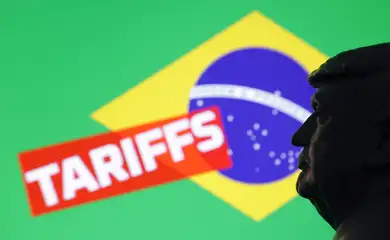 A 3D-printed miniature model of U.S. President Donald Trump, the Brazil flag and the word