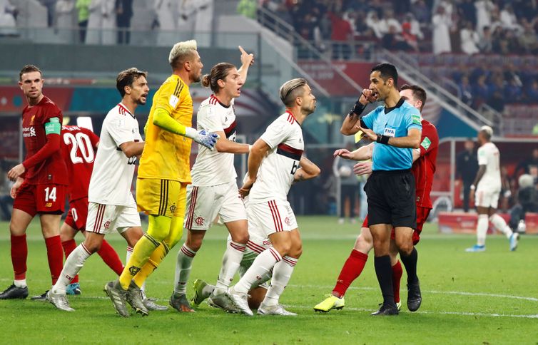 Soccer Football - Club World Cup - Final - Liverpool v Flamengo - Khalifa International Stadium, Doha, Qatar - December 21, 2019  Flamengo's Diego Alves and teammates react towards referee Abdulrahman Al Jassim       REUTERS/Corinna Kern