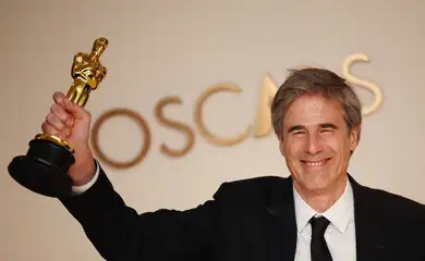 Director Walter Salles poses with the Oscar for Best International Feature Film for 