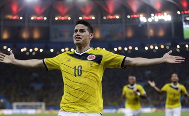 Colombia's James Rodriguez celebrates after scoring the opening goal during the World Cup round of 16 soccer match between Colombia and Uruguay at the Maracana Stadium in Rio de Janeiro, Brazil, Saturday, June 28, 2014.