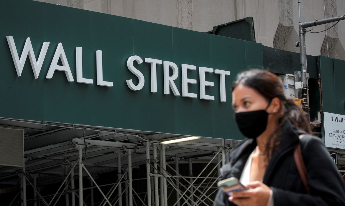 FILE PHOTO: A Wall St. sign is seen near the NYSE in New York