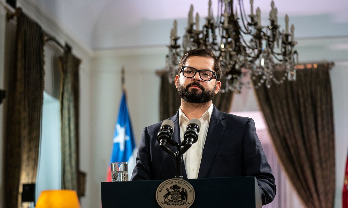 Chile's President Gabriel Boric speaks about the results of the referendum at the government palace La Moneda in Santiago