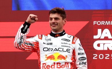 Formula One F1 - Japanese Grand Prix - Suzuka Circuit, Suzuka, Japan - April 6, 2025 Red Bull's Max Verstappen celebrates on the podium after winning the Japanese Grand Prix REUTERS/Issei Kato