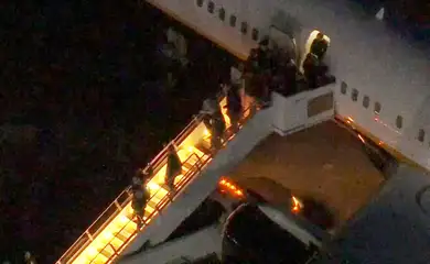 Venezuela's President Nicolas Maduro is led in custody from a U.S. federal airplane before his scheduled court appearance at Manhattan federal court, at Stewart Air National Guard Base in Newburgh, New York, U.S. January 3, 2026.  ABC Affiliate WABC via REUTERS 
NO RESALES. NO ARCHIVES. THIS IMAGE HAS BEEN SUPPLIED BY A THIRD PARTY. MANDATORY CREDIT