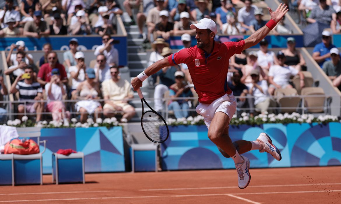 Novak Djokovic em jogo contra Dominik Koepfer
 31/7/2024     REUTERS/Claudia Greco