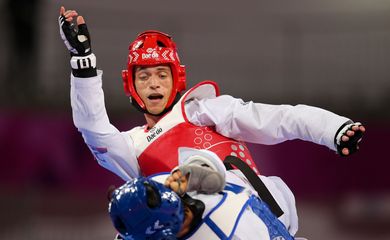 Ícaro Martins (Brasil), de vermelho, medalha de prata na categoria até 80kg do taekwondo nos Jogos Pan-Americanos Lima 2019. Local: Callao, em Lima, Peru. Data: 29.07.2019.