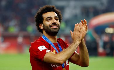 Soccer Football - Club World Cup - Final - Liverpool v Flamengo - Khalifa International Stadium, Doha, Qatar - December 21, 2019  Liverpool's Mohamed Salah celebrates winning the Club World Cup   REUTERS/Ibraheem Al Omari