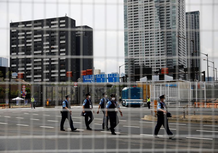 Police officers patrol at the Athletes Village ahead of Tokyo 2020 Olympic Games in Tokyo