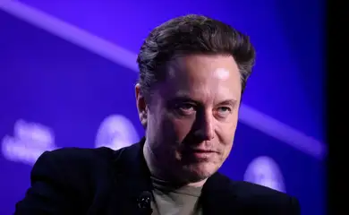 FILE PHOTO: Elon Musk, CEO of SpaceX and Tesla and owner of X looks on during the Milken Conference 2024 Global Conference Sessions at the Beverly Hilton in Beverly Hills, California, U.S., May 6, 2024. REUTERS/David Swanson//File Photo