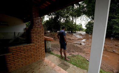 A resident is seen at his house after a dam, owned by Brazilian miner Vale SA, burst in Brumadinho, Brazil January 26, 2019. REUTERS/Washington Alves