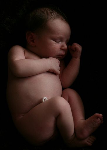 Bebê em posição fetal