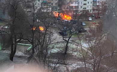 Fire is seen in Mariupol at residential area after shelling