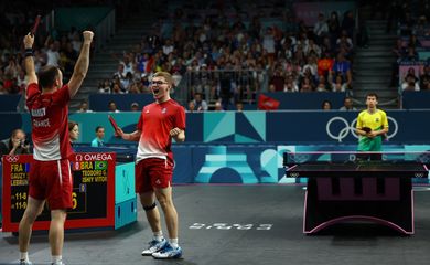 Paris 2024 Olympics - Table Tennis - Men's Team Quarterfinals - South Paris Arena 4, Paris, France - August 07, 2024.
Simon Gauzy of France and Alexis Lebrun of France celebrate after winning their quarterfinal match against Vitor Ishiy of Brazil and Guilherme Teodoro of Brazil. REUTERS/Kim Hong-Ji