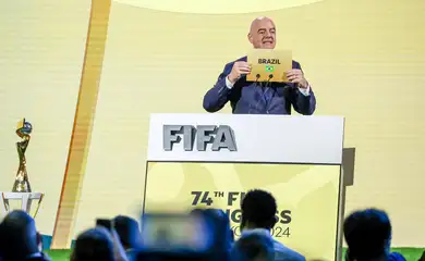 FIFA President Gianni Infantino unveils Brazil as the winner of the bid to host the Women's World Cup, during the 74th FIFA Congress at the Queen Sirikit National Convention Center in Bangkok, Thailand, May 17, 2024. REUTERS/Chalinee Thirasupa