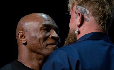 FILE PHOTO: Boxers Mike Tyson and Jake Paul face off during a news conference, ahead of their postponed professional fight which was set to take place at AT&T Stadium in Arlington, Texas on July 20, in New York City, U.S., May 13, 2024. REUTERS/David 'Dee' Delgado