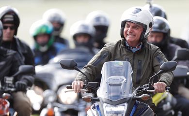 Brazil's President Jair Bolsonaro and his supporters ride motorcycles to celebrate the National Mother's Day