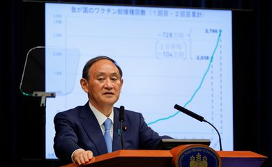Japanese Prime Minister Yoshihide Suga attends a news conference on Japan's response to the COVID-19 outbreak, in Tokyo