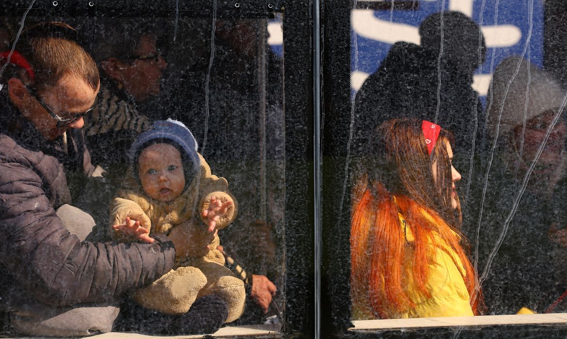 Refugees from the ongoing Russian invasion at a train station in Lviv