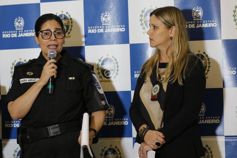 A coordenadora da Patrulha Maria da Penha, tenente-coronel PM Cláudia Moraes, e delegada de atendimento à mulher Gabriela Von Beauvais comentam medidas de combate e prevenção ao feminicídio do Governo do Estado do Rio de Janeiro.