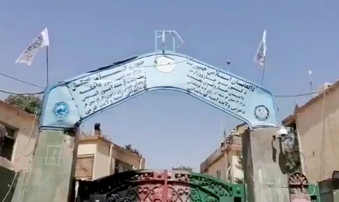 Taliban fighters gather on main road intersection in city of Ghazni