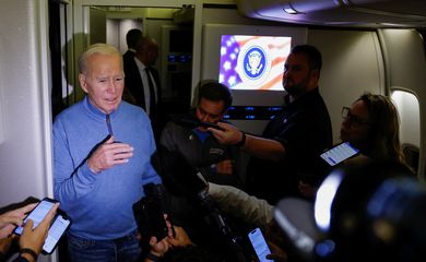U.S. President Joe Biden speaks to the press onboard of Air Force One en route from Israel at Ramstein Air Base