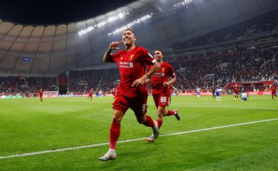 Soccer Football - Club World Cup - Semi Final - Monterrey v Liverpool - Khalifa International Stadium, Doha, Qatar - December 18, 2019  Liverpool's Roberto Firmino celebrates scoring their second goal                         REUTERS/Kai