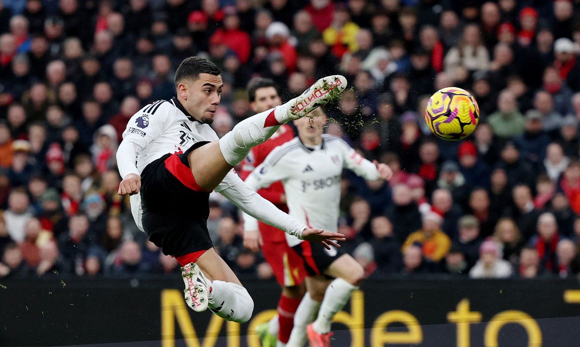 Soccer Football - Premier League - Liverpool v Fulham - Anfield, Liverpool, Britain - December 14, 2024 Fulham's Andreas Pereira scores their first goal REUTERS/Phil Noble EDITORIAL USE ONLY. NO USE WITH UNAUTHORIZED AUDIO, VIDEO, DATA, FIXTURE LISTS, CLUB/LEAGUE LOGOS OR 'LIVE' SERVICES. ONLINE IN-MATCH USE LIMITED TO 120 IMAGES, NO VIDEO EMULATION. NO USE IN BETTING, GAMES OR SINGLE CLUB/LEAGUE/PLAYER PUBLICATIONS. PLEASE CONTACT YOUR ACCOUNT REPRESENTATIVE FOR FURTHER DETAILS..     TPX IMAGES OF THE DAY