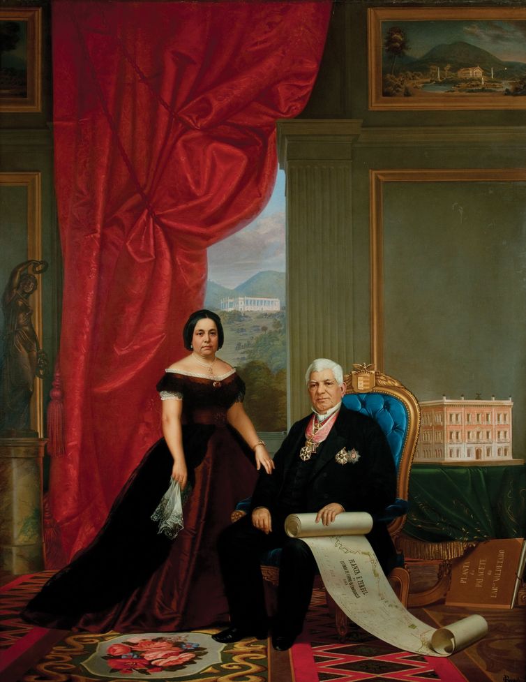 Baron and Baroness of Nova Friburgo next to a model of the Catete Palace, in an oil on canvas portrait by Emil Bausch (1867)