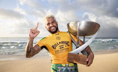 OAHU, UNITED STATES - DECEMBER 19: Italo Ferreira of Brazil winning his maiden WSL World Title at the 2019 Billabong Pipe Masters after winning the final at Pipeline on December 19, 2019 in Oahu, United States. (Photo by Kelly Cestari/WSL via