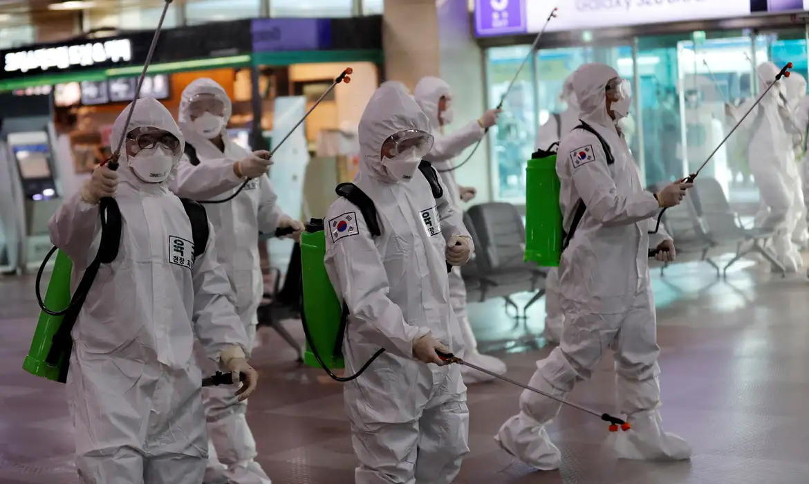 South Korean soldiers spray disinfectant at the international airport amid the rise in confirmed cases of coronavirus disease (COVID-19) in Daegu