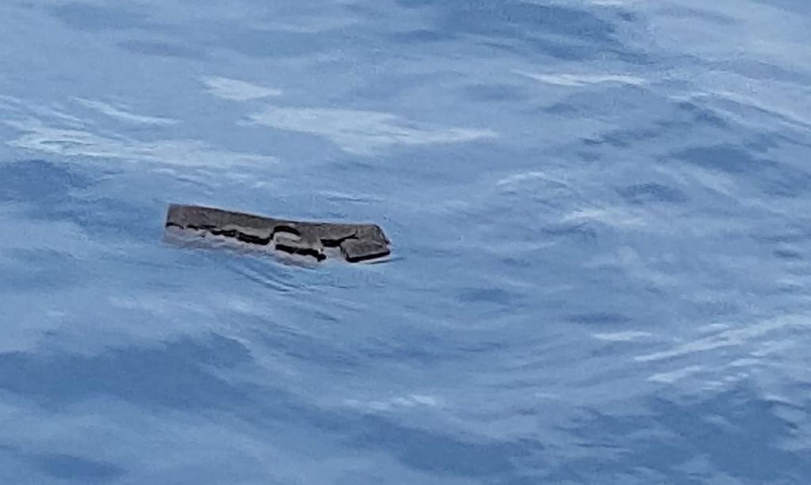 Debris believed by the Chilean Air Force to be from a Hercules C-130 military cargo plane that crashed this week and went missing, is seen in the Drake Passage or Sea of Hoces, Mid-Sea in this undated handout received on December 11, 2019. 