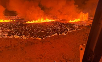 A volcano spews Lava and smoke as it erupts, north of Grindavik, Reykjanes Peninsula, Iceland, obtained by Reuters on December 19, 2023. Icelandic Coast Guard/Handout via REUTERS    THIS IMAGE HAS BEEN SUPPLIED BY A THIRD PARTY NO RESALES. NO ARCHIVES. MANDATORY CREDIT