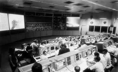 Overall view of the Mission Operations Control Room in the Mission Control Center, bldg 30, during the lunar surface extravehicular activity (EVA) of Apollo 11 Astronauts Neil A. Armstrong and Edwin E. Aldrin Jr.
