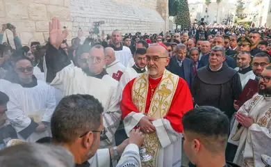Latin Patriarch of Jerusalem, Cardinal Pierbattista Pizzaballa attends Christmas celebrations in Bethlehem, in the Israeli-occupied West Bank, on Christmas Eve, December 24, 2025. REUTERS/Ammar Awad