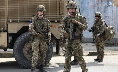 British soldiers with NATO-led Resolute Support Mission arrive at the site of an attack in Kabul