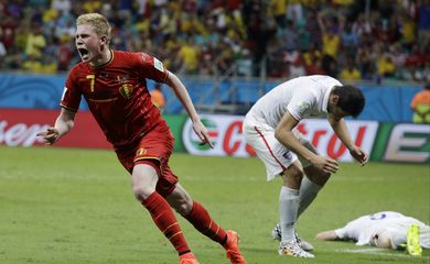 Belgium's Kevin De Bruyne celebrates after scoring the opening goal during the World Cup round of 16 soccer match between Belgium and the USA at the Arena Fonte Nova in Salvador, Brazil, Tuesday, July 1, 2014. (AP Photo