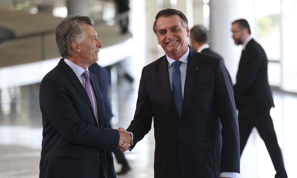 Presidente Jair Bolsonaro recebe o presidente argentino, Mauricio Macri no Palácio do Planalto durante cerimônia oficial de chegada.