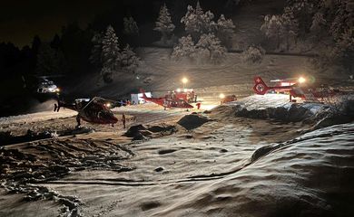 Helicopters are pictured during a rescue operation after six touring skiers went missing, in Evolene, Switzerland, in this handout picture released on March 11, 2024. Police Cantonale Valaisanne/Handout via REUTERS THIS IMAGE HAS BEEN SUPPLIED BY A THIRD PARTY. NO RESALES. NO ARCHIVES