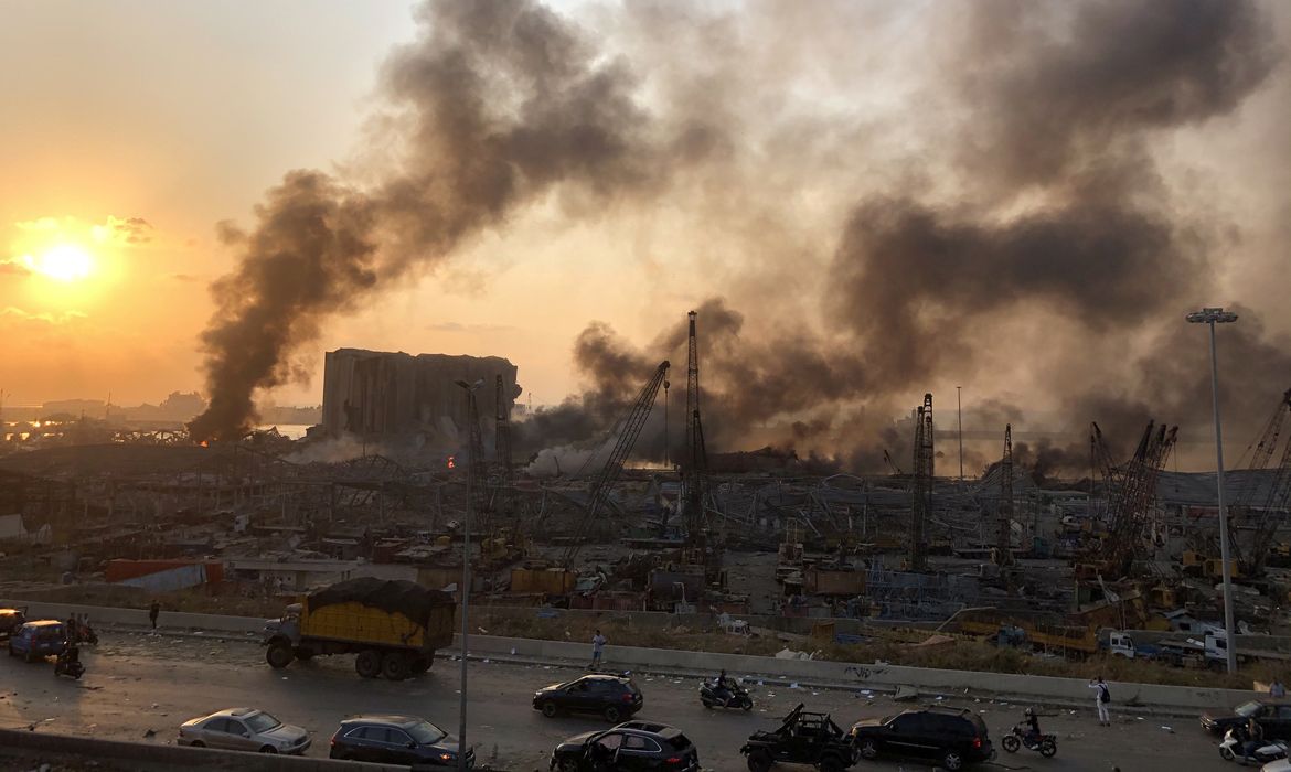 Smoke rises from the site of an explosion in Beirut