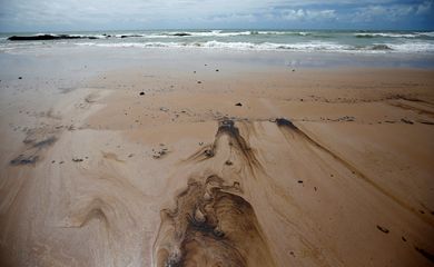 Oil spil is seen on Coruripe beach, Alagoas state