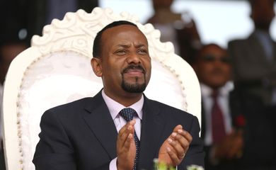 FILE PHOTO: Ethiopia's newly elected prime minister Abiy Ahmed attends a rally during his visit to Ambo in the Oromiya region, Ethiopia April 11, 2018. REUTERS/Tiksa Negeri/File Photo