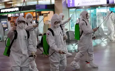 South Korean soldiers spray disinfectant at the international airport amid the rise in confirmed cases of coronavirus disease (COVID-19) in Daegu