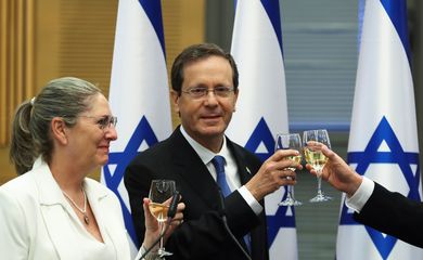President-elect Isaac Herzog and his wife Michal celebrate after a special session of the Knesset whereby Israeli lawmakers elected the new president, at the Knesset, Israel's parliament, in Jerusalem