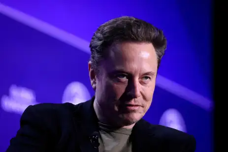 FILE PHOTO: Elon Musk, CEO of SpaceX and Tesla and owner of X looks on during the Milken Conference 2024 Global Conference Sessions at the Beverly Hilton in Beverly Hills, California, U.S., May 6, 2024. REUTERS/David Swanson//File Photo