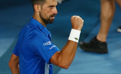 Tennis - Australian Open - Melbourne Park, Melbourne, Australia - January 19, 2025 Serbia's Novak Djokovic celebrates at match point during his fourth round match against Czech Republic's Jiri Lehecka REUTERS/Edgar Su