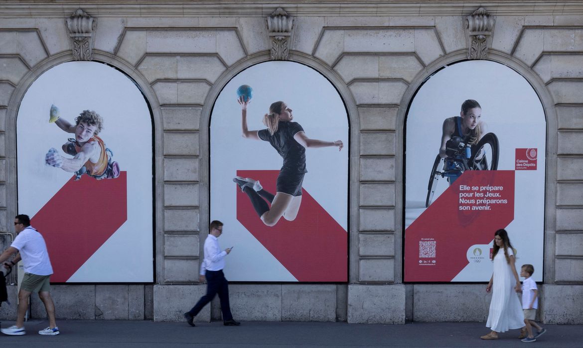 Cartazes olímpicos em Paris
 27/8/2024   REUTERS/Umit Bektas