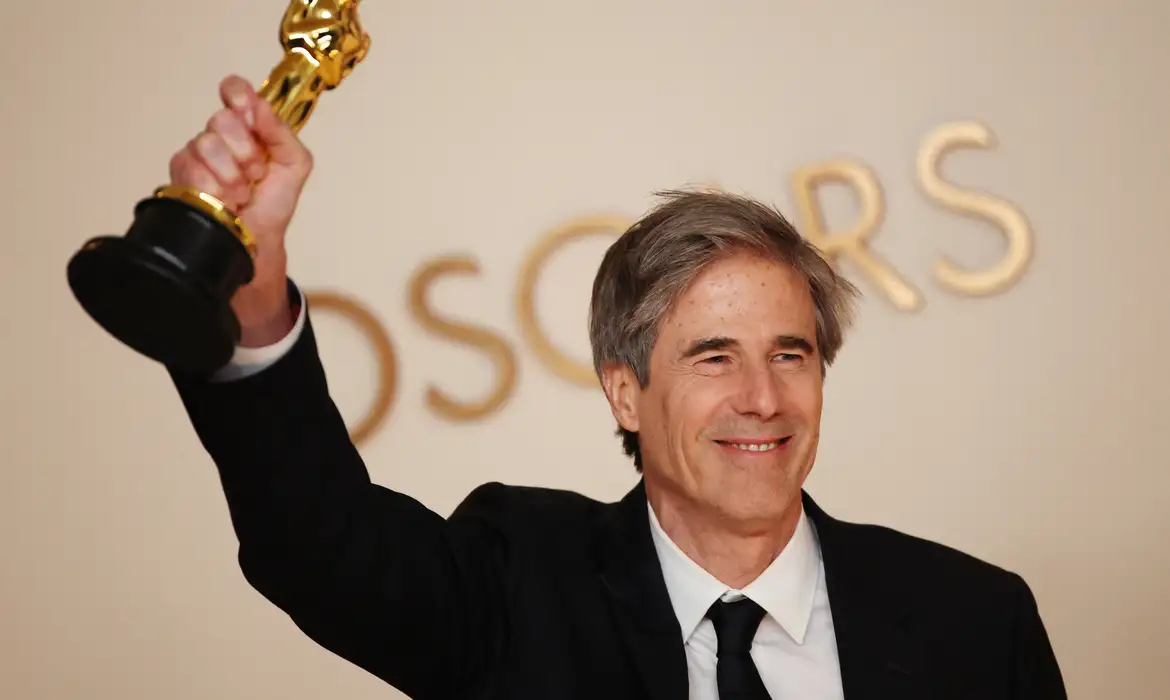 Director Walter Salles poses with the Oscar for Best International Feature Film for 